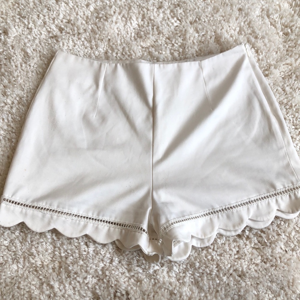 Dressy scalloped-edge white shorts
